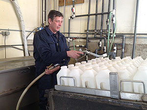 Henry filling bottles